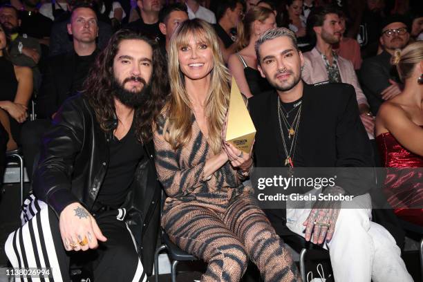 Tom Kaulitz , Heidi Klum and Bill Kaulitz during the 3rd ABOUT YOU Awards at Bavaria Studios on April 18, 2019 in Munich, Germany.