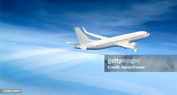 gerneric aircraft in flight - airplane stock-fotos und bilder