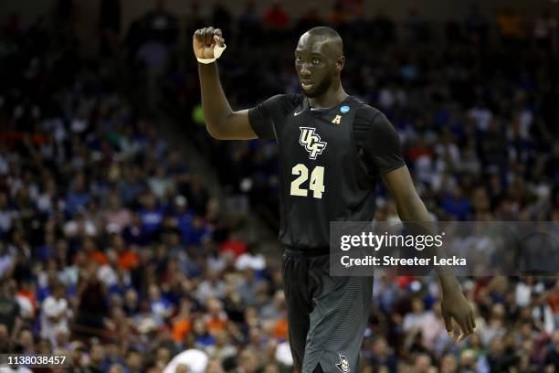 Tacko Fall of the UCF Knights reacts against the UCF Knights during the second half in the second round game of the 2019 NCAA Men's Basketball...