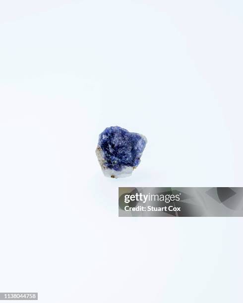 lapis lazuli with milky quartz. lapis lazuli is a complex sodium aluminium silicate mineral, the main constituent being lazurite with inclusions of sulphur, chlorine, pyrite and calcite. in crystal healing it is said to promote communication and inner vis - lapis lazuli ストックフォト��と画像