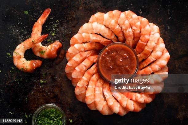 ring of shrimps - shrimp with cocktail sauce stock pictures, royalty-free photos & images