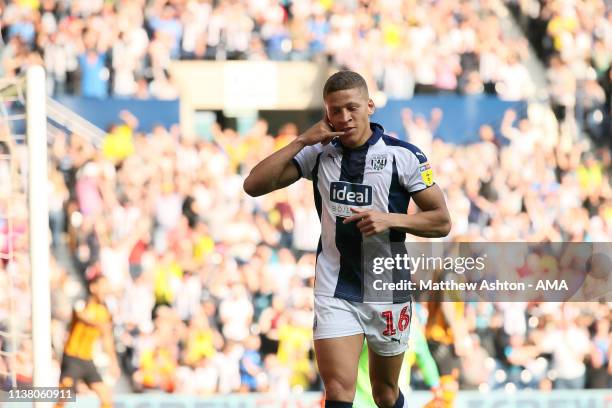 Dwight Gayle of West Bromwich Albion celebrates after scoring a goal to make it 3-2 during the Sky Bet Championship fixture between West Bromwich...