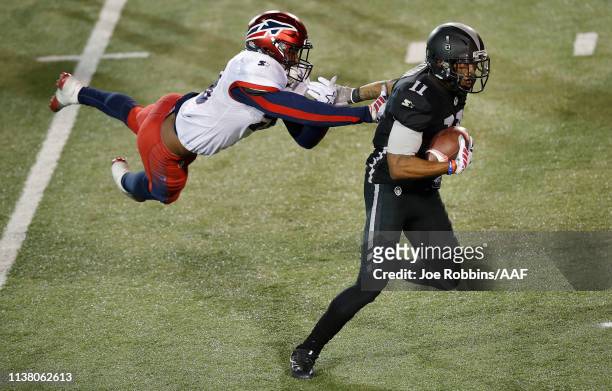 Quinton Patton of the Birmingham Iron catches a first-down pass on a fourth-down play against DeMarquis Gates of the Memphis Express during the...