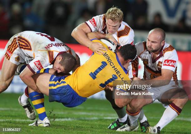 Mark Minichiello of City is tackled during the ARL Origin match between Country and City at Lavington Sports Ground on May 6, 2011 in Albury,...