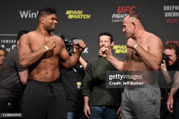 Alistair Overeem of The Netherlands and Aleksei Oleinik of Russia face off during the UFC Fight Night weigh-in at Yubileyny Sports Palace on April...