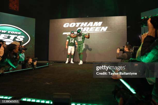 New York Jets QB Sam Darnold and Bronson Kaufusi modeling uniforms during unveiling of new uniforms and branding launch event at Gotham Hall. New...