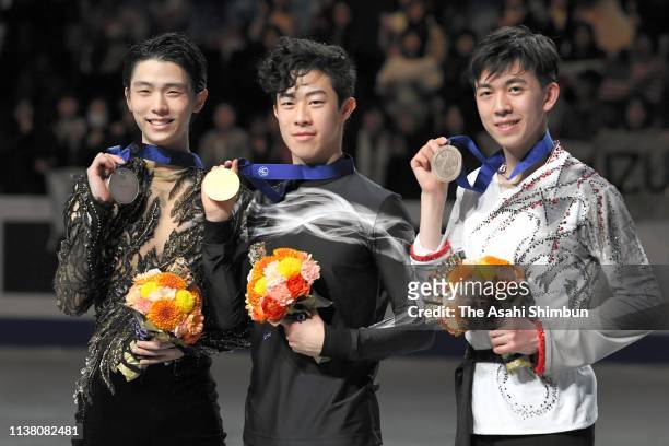 Silver medalist YuzuruÂ Hanyu of Japan, gold medalist NathanÂ Chen of the United States and bronze medalist VincentÂ Zhou of the United States pose...