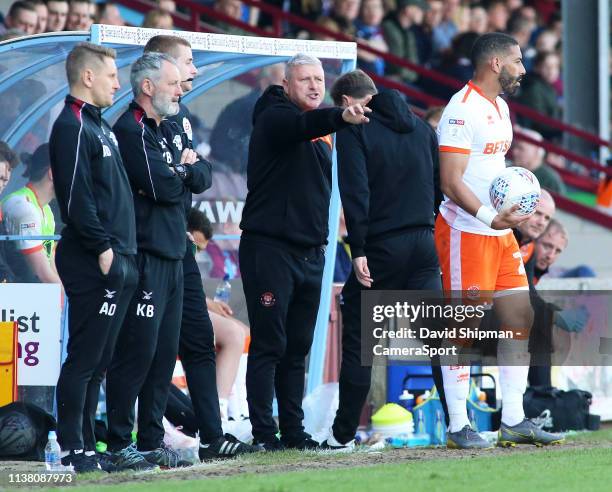 Blackpool's Manager Terry McPhillips shouts instructions to his team from the touchline during the Sky Bet League One match between Scunthorpe United...