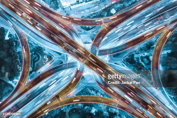 aerial view of shanghai highway at night - traffic stock pictures, royalty-free photos & images