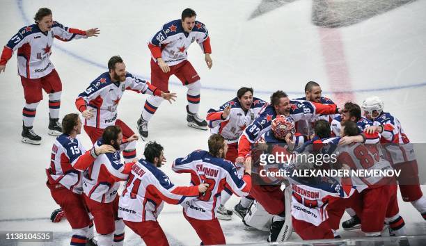 Moscow players celebrate their victory over Avangard Omsk after the Gagarin Cup 2019 final series game of the Russian Kontinental Hockey League...