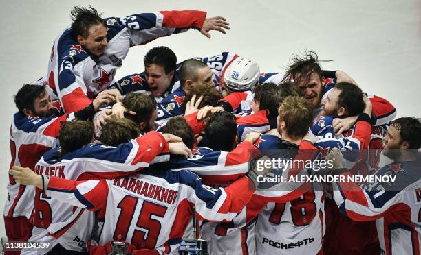 Moscow players celebrate their victory over Avangard Omsk after the Gagarin Cup 2019 final series game of the Russian Kontinental Hockey League...