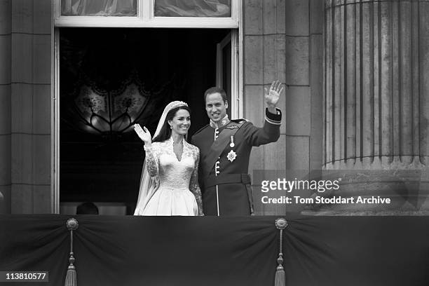Prince William and Catherine, Duchess of Cambridge greet well-wishers from the balcony at Buckingham Palace after their wedding, London, 29th April...