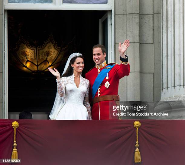 Prince William and Catherine, Duchess of Cambridge greet well-wishers from the balcony at Buckingham Palace after their wedding, London, 29th April...