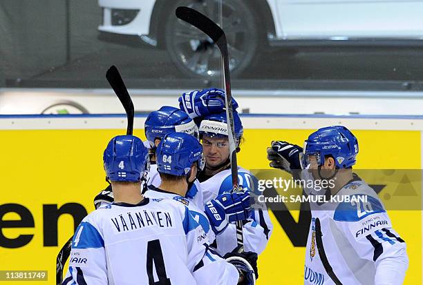 Finland's players celebrate their goal during the IIHF Ice Hockey World Championship Qualification round match against Germany, in Bratislava, on May...