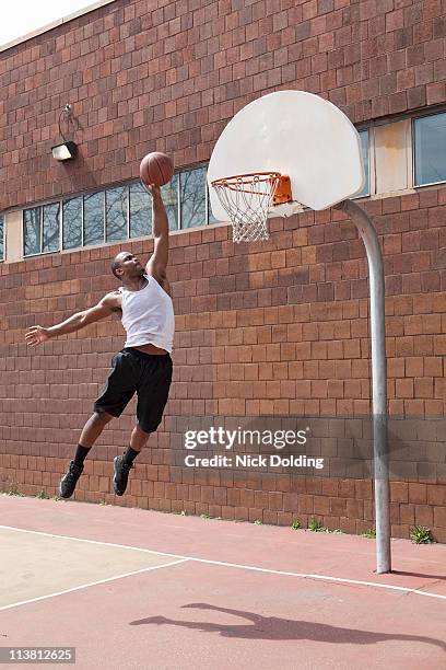 ny urban basketball 03 - basketball dunk stock pictures, royalty-free photos & images