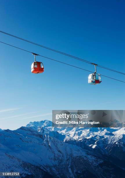 view of ski lifts over la plagne mountains - savoie fotografías e imágenes de stock