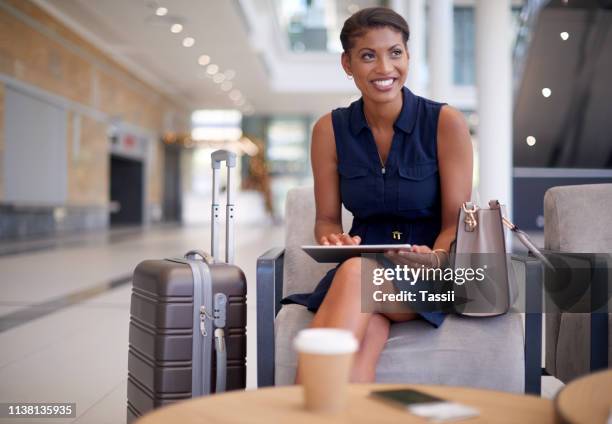 she's got ideas that'll guarantee success - businesswoman airport stock pictures, royalty-free photos & images