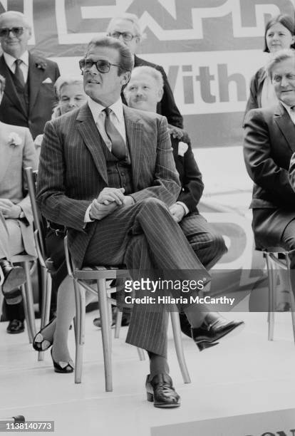 English actor Roger Moore attends an inaugural event in Central London, UK, 7th June 1983.