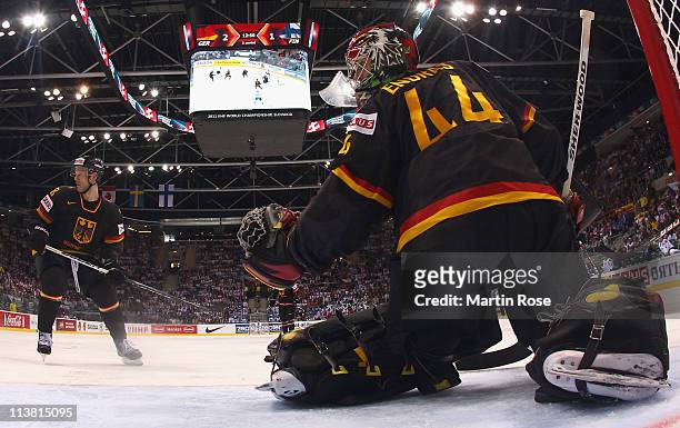 Dennis Endras , goaltender of Germany saves the puck during the IIHF World Championship qualification match between Germany and Finland at Orange...