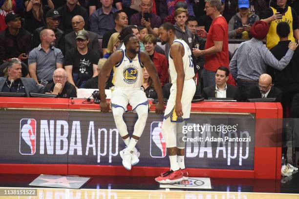 Draymond Green of the Golden State Warriors talks with Kevin Durant of the Golden State Warriors during the game against the LA Clippers during Game...