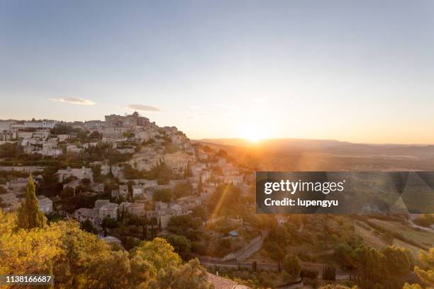 gordes in provence, france at sunrise - vaucluse stock pictures, royalty-free photos & images