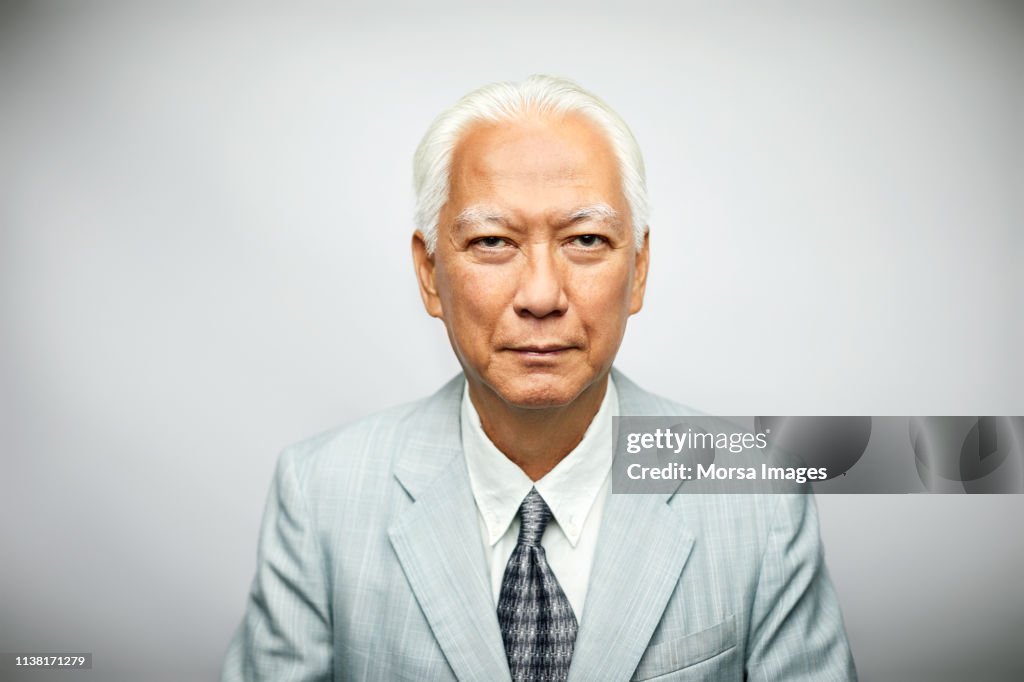 Portrait of senior businessman wearing suit