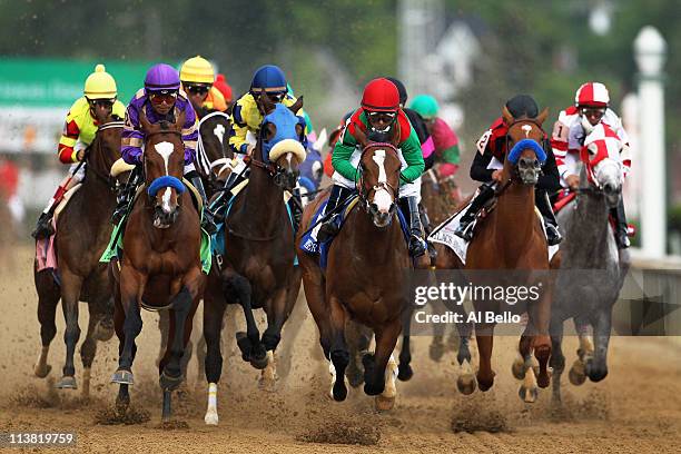 The field runs along the front stretch to start the 137th Kentucky Oaks at Churchill Downs on May 6, 2011 in Louisville, Kentucky.