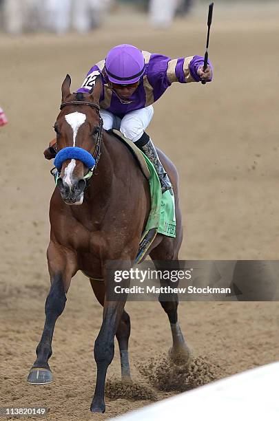 Jockey Martin Garcia, riding Plum Pretty, heads towards the finish line to win the 137th Kentucky Oaks at Churchill Downs on May 6, 2011 in...