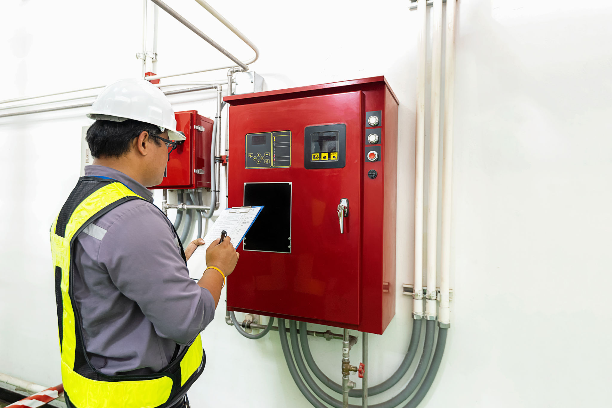 technician inspecting equipment