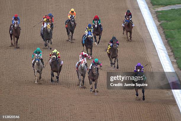 Jockey Martin Garcia , riding Plum Pretty heads towards the finish line to edge out Jockey Rosie Napravnik, riding St. John's River for the win...