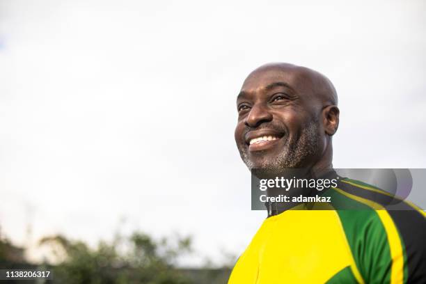 portrait of a black cyclist - distinguished gentlemen with white hair stock pictures, royalty-free photos & images