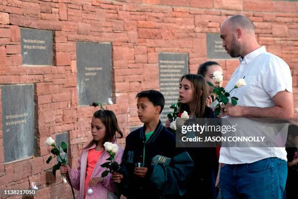 Will Beck , a Columbine High School massacre survivor, and his family visit the Columbine Memorial at Clement Park in Littleton, Colorado, during a...