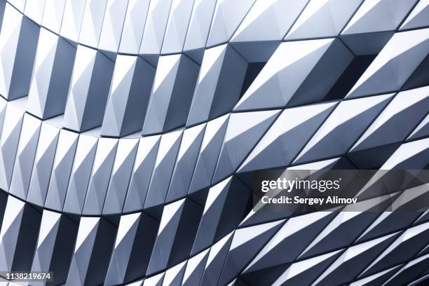 futuristic design of building in tokyo - corporate textures stock-fotos und bilder