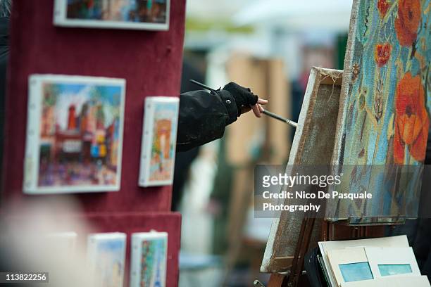 young woman is artist she is painting - montmartre stock-fotos und bilder