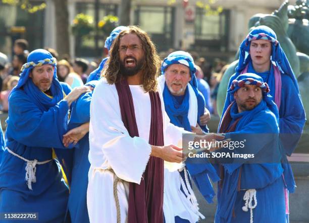 Jesus with his disciples during a performance of 'The Passion of Jesus' by Wintershall players in Trafalgar Square. Around 20,000 people packed...