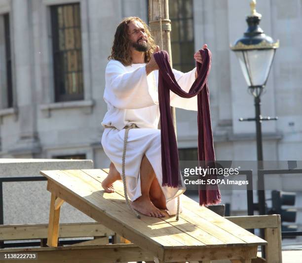 Jesus Christ during a performance of 'The Passion of Jesus' by Wintershall players in Trafalgar Square. Around 20,000 people packed London's...