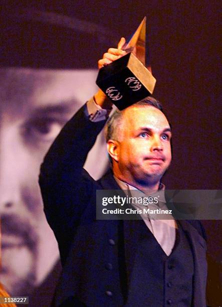 Country singer Garth Brooks accepts one of three awards during a live broadcast of the 27th Annual American Music Awards show January 17, 2000 at the...