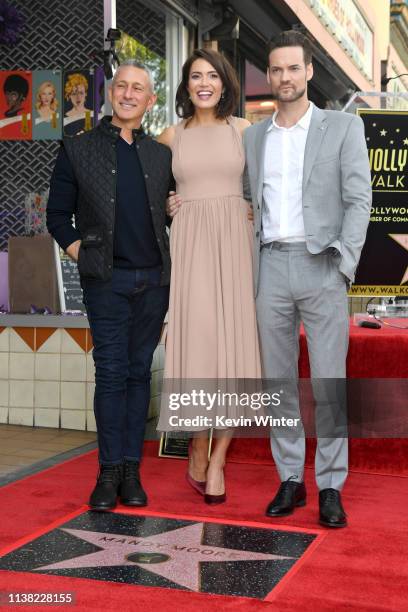 Adam Shankman, Mandy Moore, and Shane West attend a ceremony honoring Mandy Moore with a star on the Hollywood Walk Of Fame on March 25, 2019 in...