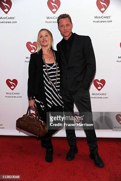 Actress Christina Applegate and fiance Martyn Lenoble arrives at the 7th Annual MusiCares MAP Fund Benefit at Club Nokia, LA Live on May 6, 2011 in...