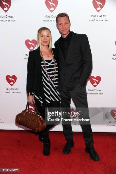 Actress Christina Applegate, Martyn Lenoble arrive at the 7th Annual MusiCares MAP Fund Benefit at Club Nokia, LA Live on May 6, 2011 in Los Angeles,...