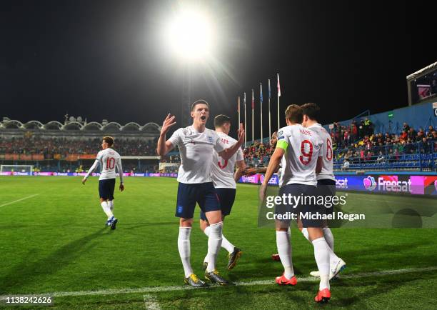 Declan Rice of England celebrates with team mates as Michael Keane scores his team's first goal during the 2020 UEFA European Championships Group A...