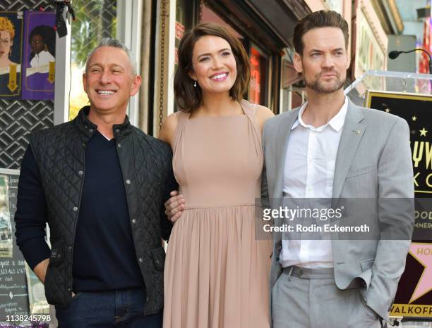 Adam Shankman, Mandy Moore, and Shane West attend a ceremony honoring Mandy Moore with a star on the Hollywood Walk Of Fame on March 25, 2019 in...