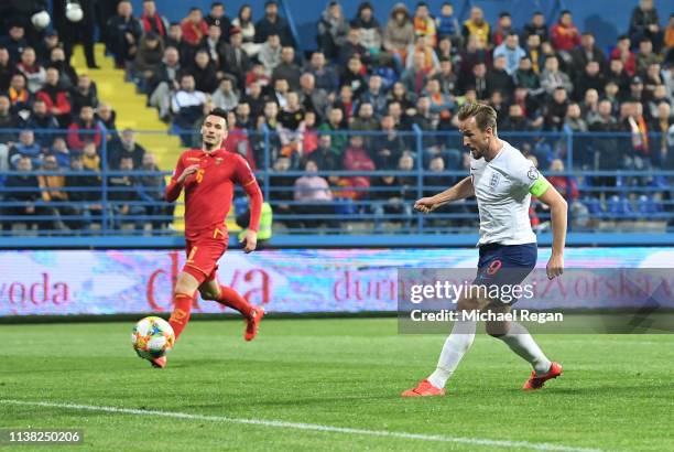 Harry Kane of England scores his team's fourth goal during the 2020 UEFA European Championships Group A qualifying match between Montenegro and...