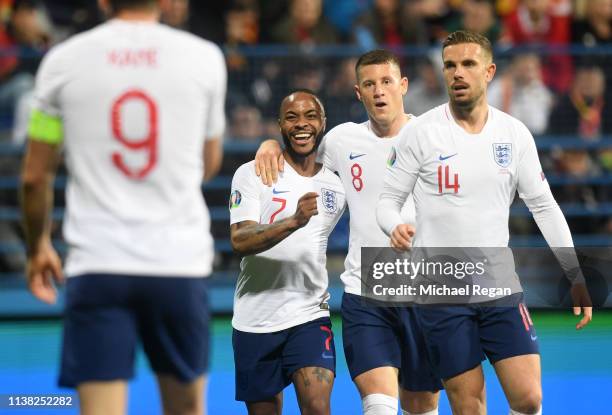 Raheem Sterling, Ross Barkley and Jordan Henderson of England congratulate Harry Kane as scores his team's fourth goal during the 2020 UEFA European...