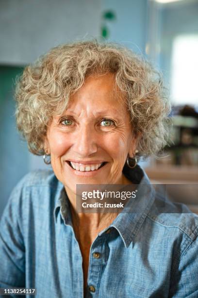portrait of happy senior woman at nursing home - hazel eyes stock pictures, royalty-free photos & images