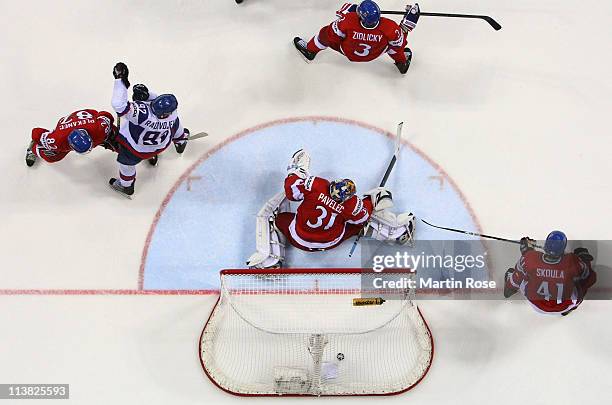 Mikko Koivu of Finland scores his team's 3rd goal against Ondrej Pavelec , goaltender of Czech Republic during the IIHF World Championship...