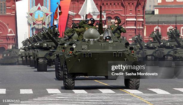 Russian APC and tanks manoeuvre during May Day parade rehearsals in front of St.Basil's cathedral at Red Square, May 7, 2011 in Moscow, Russia....