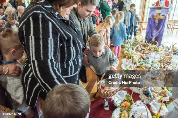 Family during the ceremony of blessing Easter basketsat at Good Shepherd Catholic Church, Cumasu Centre, Doughiska Road, in Galway on Saturday ,...