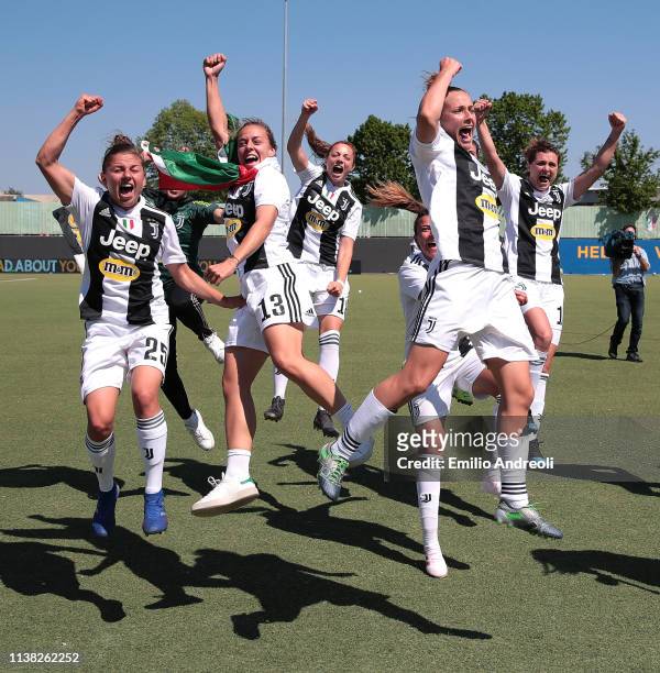 Juventus Women players celebrate after winning the Serie A Championship at the end of the Women Serie A match between Hellas Verona Women and...
