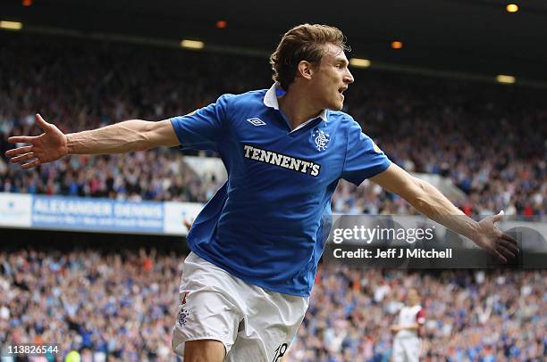 Nikica Jelavic of Rangers celebrates after scoring during the Clydesdale Bank Premier League match between Rangers and Hearts at Ibrox Stadium on May...